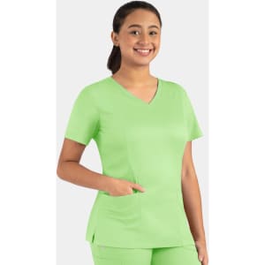 A woman wearing a bright green Matrix Women's Double V-Neck Top with short sleeves and a pocket.
