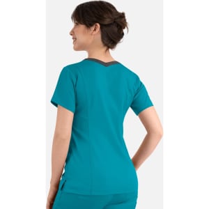 A women's teal double v-neck top featuring a contrasting neckline and short sleeves, displayed from the back.