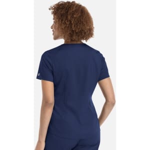 A women's tuckable V-neck top in navy, featuring a fitted design and a logo on the sleeve.