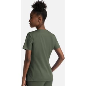 A green notched crew neck top for women, featuring a fitted design and a logo on the back.