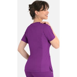 A women's curved mock wrap top in vibrant purple, featuring short sleeves and a fitted design.