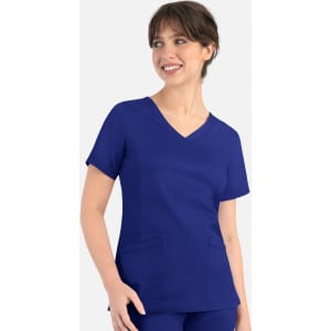 A woman is wearing a navy blue curved mock wrap top with short sleeves and pockets. The top features a V-neck design.