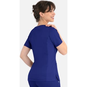A women's curved mock wrap top in a vibrant royal blue colour, featuring short sleeves and a fitted design.