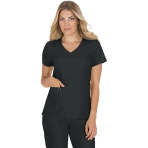 A black medical scrub top featuring a V-neck design and two front pockets, modelled by a woman.