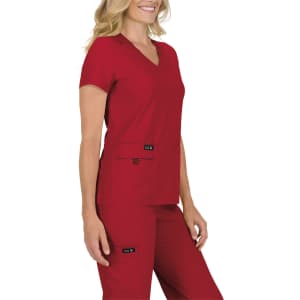 A red women's top with short sleeves and a V-neck, featuring two front pockets. Branding is visible on the pockets.