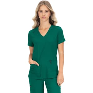 A green medical scrub top with a V-neck design and two front pockets, featuring a logo on the sleeve.