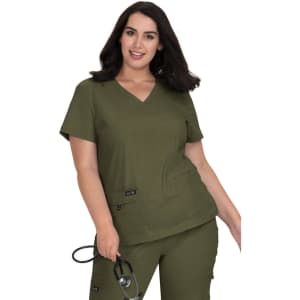 A woman wearing a v-neck olive green medical scrubs top with two pockets, holding a stethoscope.