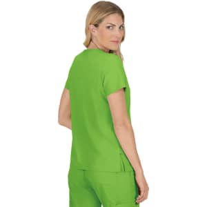 A woman is wearing a vibrant green top, styled for a casual or professional look, featuring short sleeves.