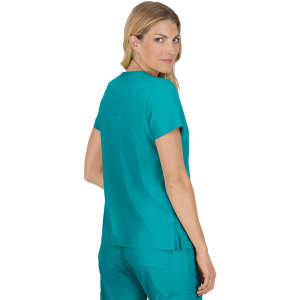 A woman wearing a teal medical top, shown from the back, featuring a loose fit and short sleeves.