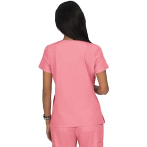 A pink women's top featuring short sleeves and a simple design, displayed from the back. It has a logo on the fabric.