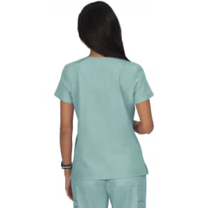 A women's top in a light teal colour, featuring short sleeves and a simple design, with a logo on the back.