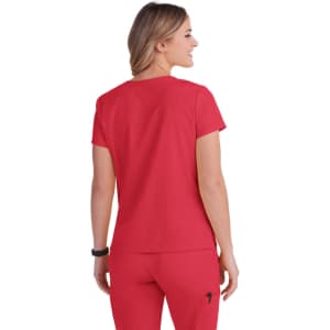 A red women's top with short sleeves, featuring a simple design and visible branding on the back.