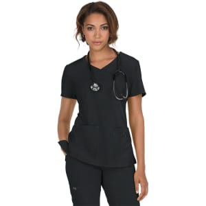A black medical top with short sleeves, featuring pockets and a stethoscope draped around the model's neck.