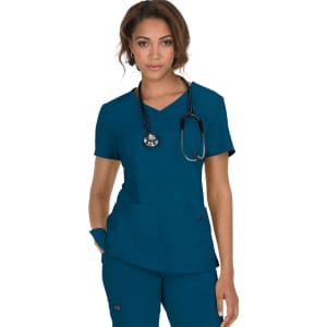 A scrubs top in teal, featuring a V-neck design and two front pockets, paired with a stethoscope.