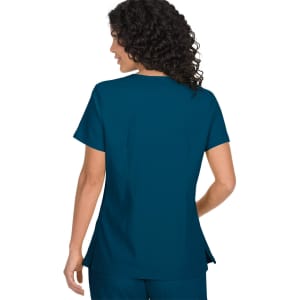 A teal top with a relaxed fit and short sleeves, featuring a back view of a woman with curly hair.