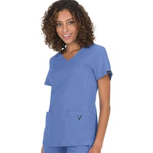 A blue medical top featuring a V-neck design and two front pockets. The top includes a branding logo on the sleeve.