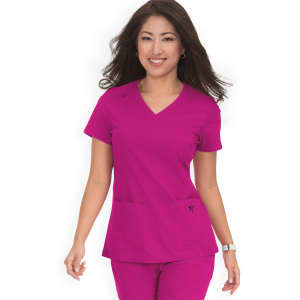 A scrub top in vibrant magenta with a V-neck design and two front pockets. Features a logo on the upper left.