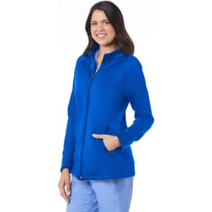 A woman's warm-up fleece jacket in bright blue, featuring a zip front and side pockets, with a branded logo.