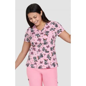 A pink top featuring a playful print of cats and bows, paired with matching pink trousers. The design is vibrant and fun.