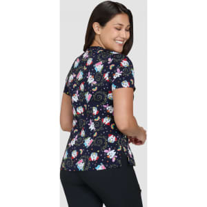 A printed top featuring a dark navy background with colourful patterns of cartoon characters and shapes.