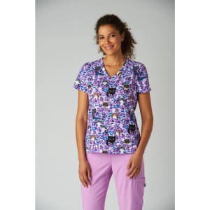 A purple patterned T-shirt featuring cats, worn by a model. The shirt has a V-neck design and short sleeves.