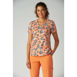 A women's short-sleeved top featuring a vibrant orange colour with artistic prints in blue and white. It has a relaxed fit.