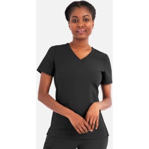 A woman wearing a black, layered V-neck top with short sleeves, featuring a logo.