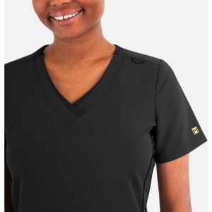 A women's black layered V-neck top with short sleeves and a logo on the sleeve.