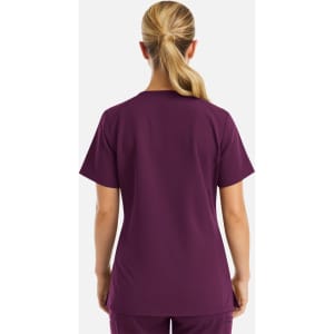 A purple women's top with short sleeves and a curved hem, featuring a simple design and no visible logos.