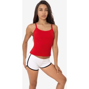 A red spaghetti tank top worn with white shorts, featuring adjustable straps and a fitted design.
