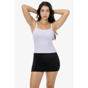 A light purple spaghetti tank top with thin straps, worn with a black mini skirt. It features a logo on the top.