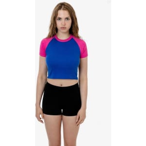 A vibrant blue and pink short sleeve baby rib raglan tee displayed on a model, paired with black shorts.