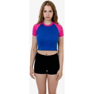 A short sleeve baby rib raglan tee featuring a blue body and pink sleeves, displayed on a model.