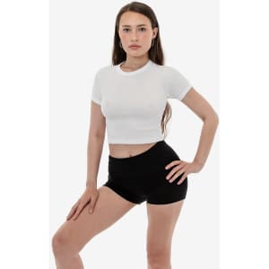A white short sleeve baby rib raglan tee is displayed on a model wearing black shorts. The shirt has a fitted cut.