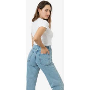 A mid-length baby rib crewneck tee in white, paired with high-waisted blue jeans, featuring a model.
