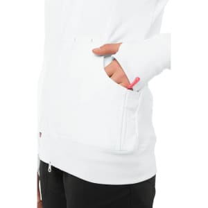A white jacket with a zip-up front and a pocket, featuring a small zip detail in a contrasting colour.
