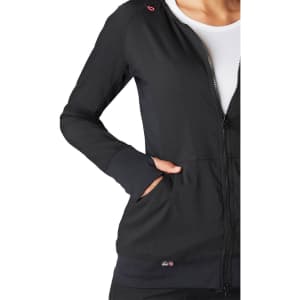 A black jacket with a zip front, featuring pockets and a fitted design. It has a logo on the hem.