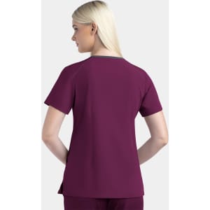 A women's contrast V-neck top in burgundy, featuring a short-sleeve design and a branding logo.