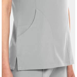 A women's V-neck top in light grey featuring a stylish design and a side pocket. It has a simple branding logo.