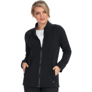 A black wellness jacket with a full zip and side pockets, featuring a subtle logo on the hem.