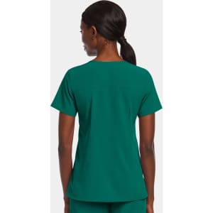 A women's mock wrap top in deep green, featuring a back design and a logo.