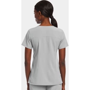 A grey women's mock wrap top, featuring a short sleeve design and a fitted silhouette, with branding on the garment.