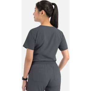 A grey V-neck top with short sleeves, featuring a tuckable design and logo on the back.