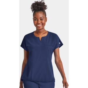 A women's navy blue notched neck dolman top featuring short sleeves and a front pocket. It includes a branding logo.