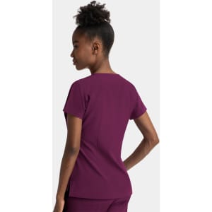 A women's notched neck dolman top in a rich burgundy colour. The top features a simple design and short sleeves.