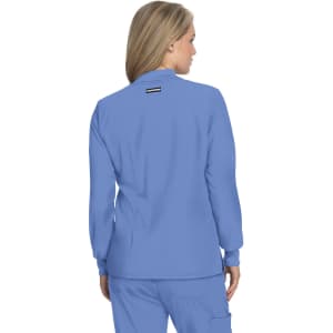 A light blue jacket with a back view, featuring long sleeves and a subtle logo.