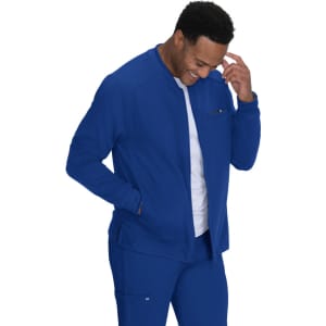 A blue jacket with a zip front, featuring a chest pocket, worn by a smiling man. The jacket has a relaxed fit.