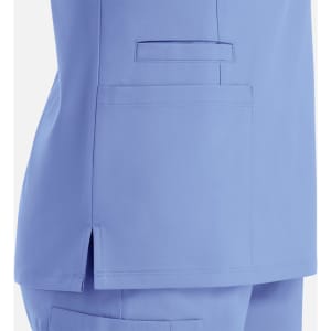 A garment in light blue with a double V-neck design and a side pocket detail. Features a logo on the fabric.