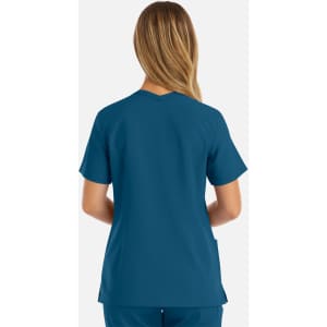 A women's double V-neck top in a teal colour, featuring short sleeves and a relaxed fit. It has a logo on the garment.