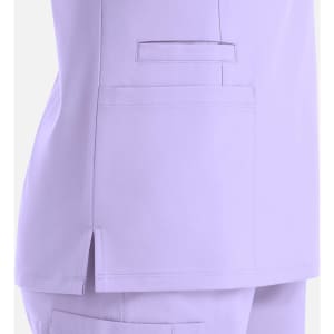 A lilac women's double V-neck top featuring side slits and a pocket on the lower left side. It has branding.